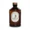 Flacon de sirop de caramel salé Bacanha, une gourmandise à ajouter à tous vos desserts.