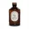 Bouteille de sirop de fleur de sureau Bacanha sur fond naturel