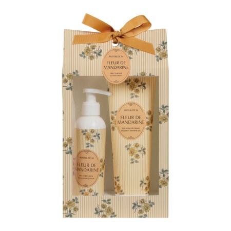 Coffret Mathilde M contenant un lait pour le corps et un gel douche parfumés à la fleur de mandarine, présenté dans un élégant packaging raffiné
