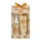 Coffret Mathilde M contenant un lait pour le corps et un gel douche parfumés à la fleur de mandarine, présenté dans un élégant packaging raffiné