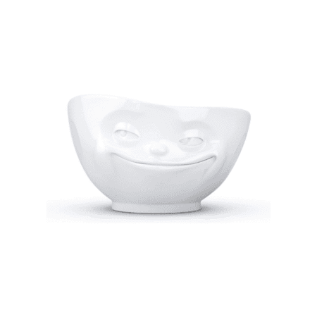 Bol blanc avec un sourire espiègle prêt à piéger ton p’tit dej