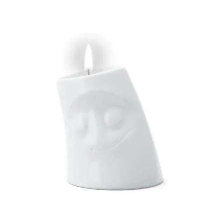 Bougeoir en céramique avec une expression de calme et de douceur.