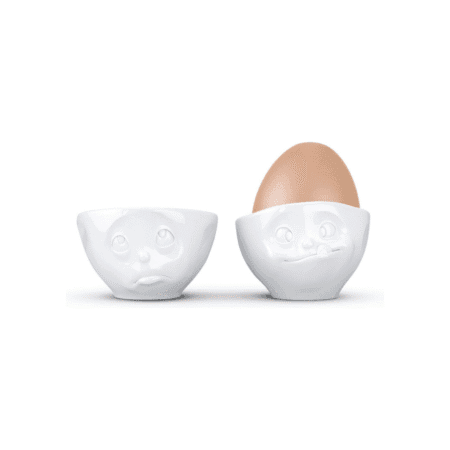 Duo de coquetiers expressifs : l’un quémande gentiment, l’autre affiche une expression de gourmandise