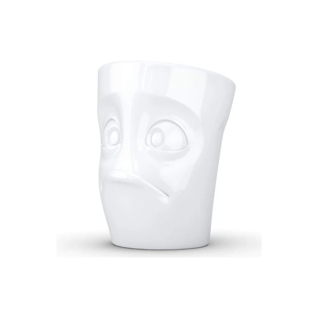Mug avec anse et visage implorant plein de douceur.