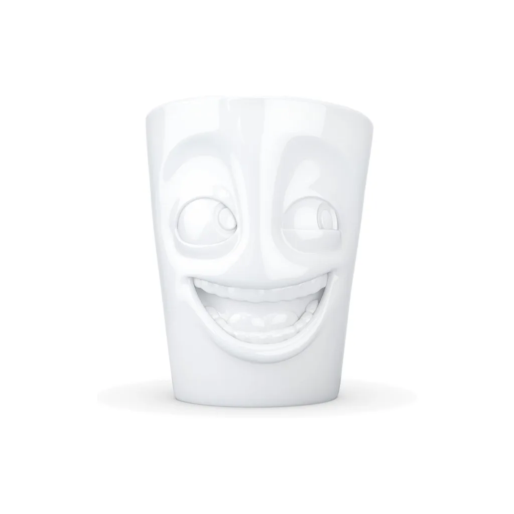 Mug avec anse affichant un visage rieur et plein de vie.