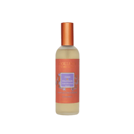 Flacon élégant de parfum d’ambiance Colline de Provence Ambre Héliotrope 100ml, posé dans un décor cocooning chic.