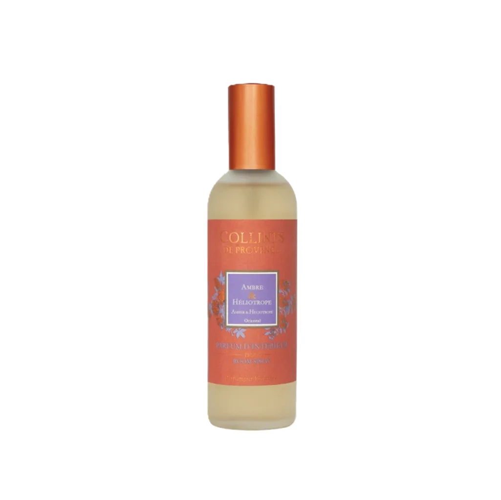 Flacon élégant de parfum d’ambiance Colline de Provence Ambre Héliotrope 100ml, posé dans un décor cocooning chic.
