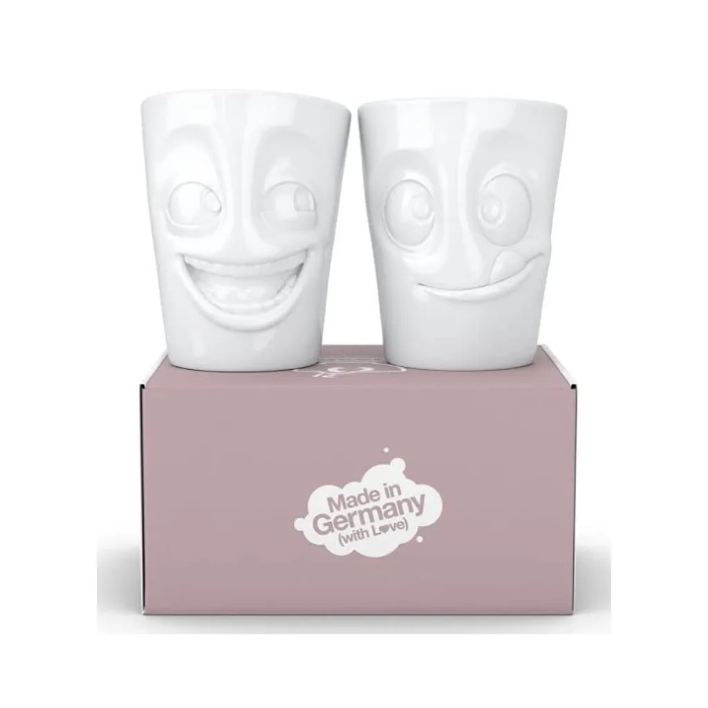 Set de deux mugs sans anse, l’un au large sourire éclatant, l’autre affichant une expression gourmande et impatiente.