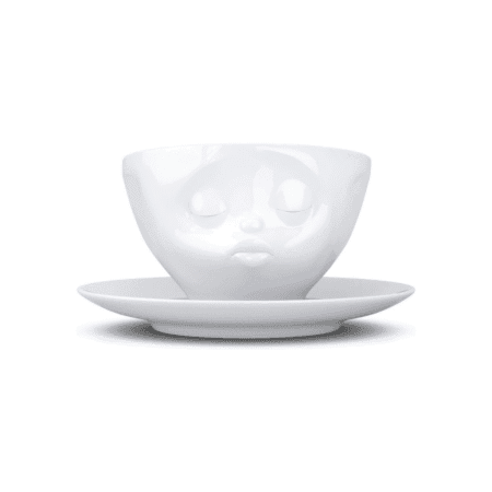 Tasse à thé avec anse et expression douce, bouche en forme de bisou, vue de face.