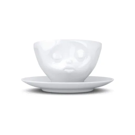 Tasse à thé avec anse et expression douce, bouche en forme de bisou, vue de face.