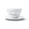 Tasse à thé en céramique avec visage faisant un clin d'œil, vue de face