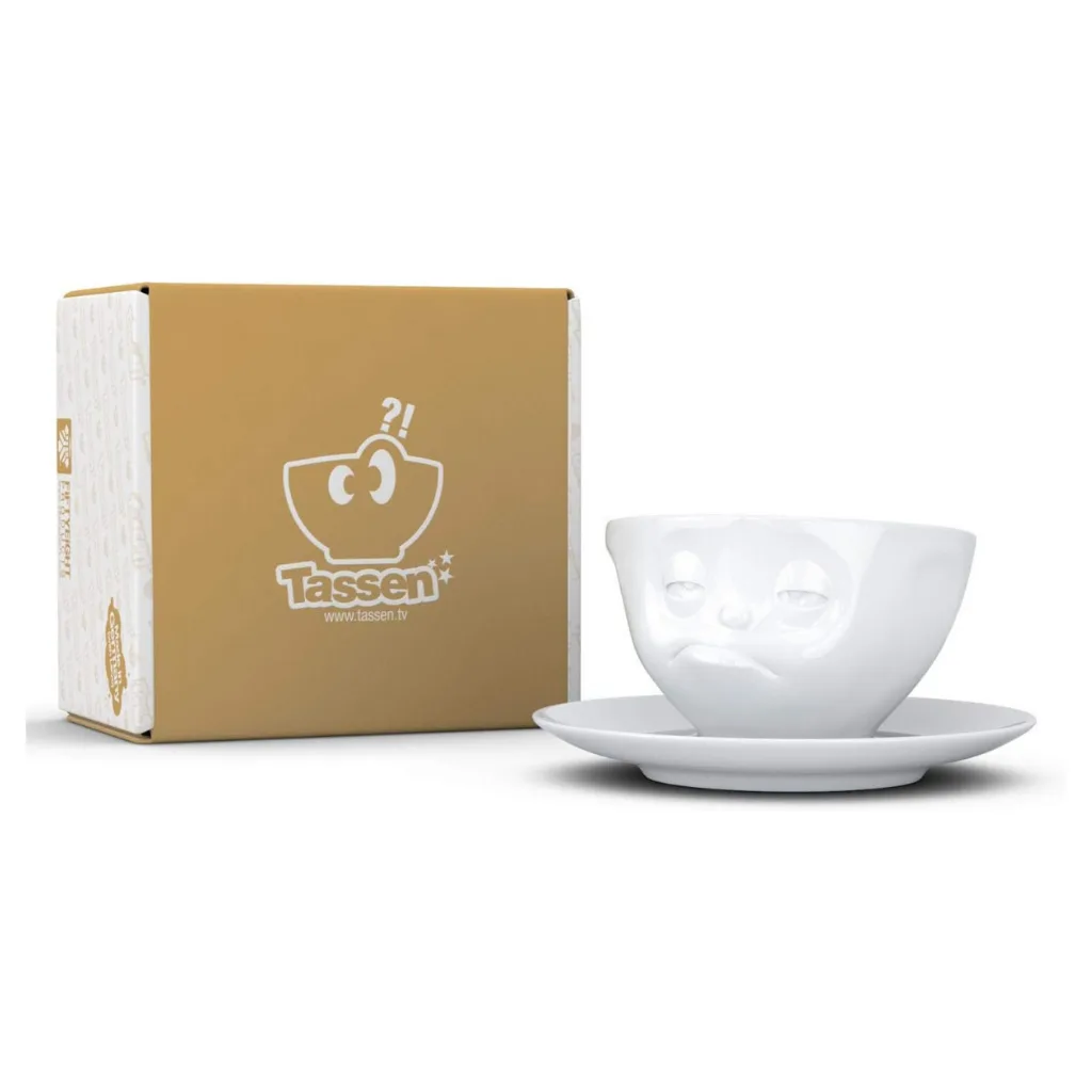 Tasse à thé vue du dessus, visage fatigué en céramique