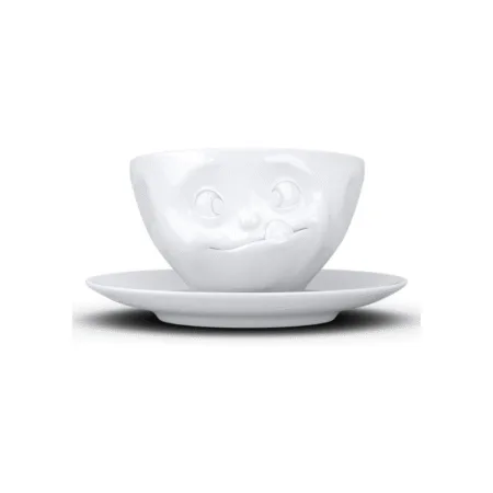 Tasse à thé avec visage tirant la langue, expression gourmande, vue de face