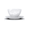 Tasse à thé avec visage tirant la langue, expression gourmande, vue de face