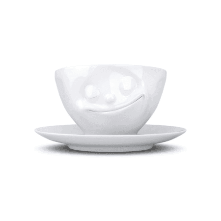 Tasse à thé avec visage souriant, expression joyeuse, vue de face