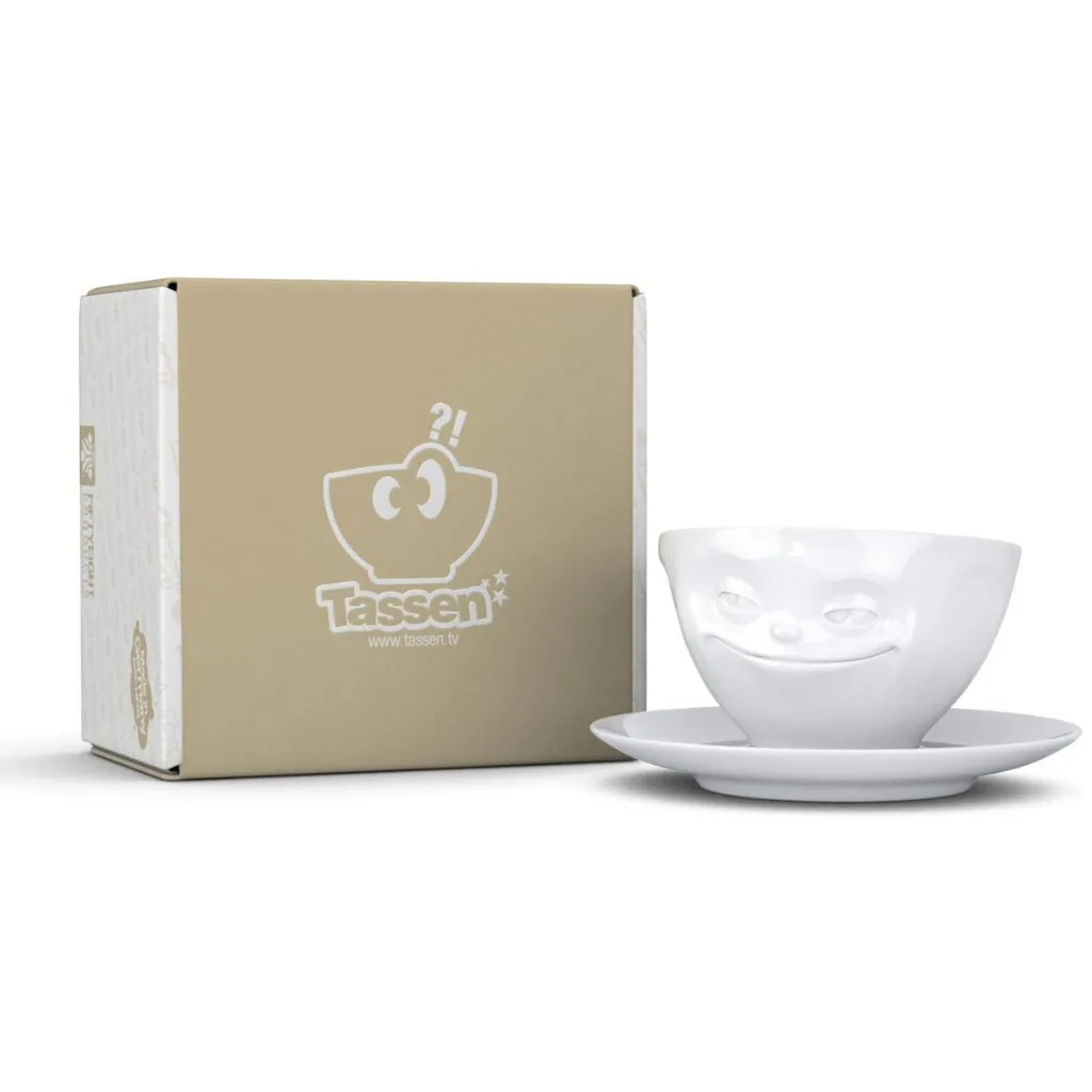 Tasse à thé vue du dessus, visage rusé en céramique
