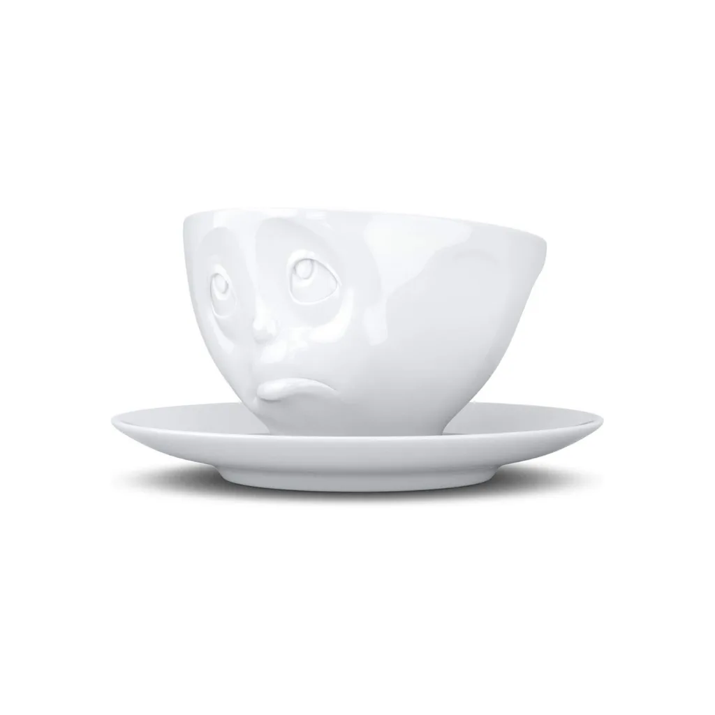 Tasse à thé expressive, visage suppliant, vue de trois-quarts