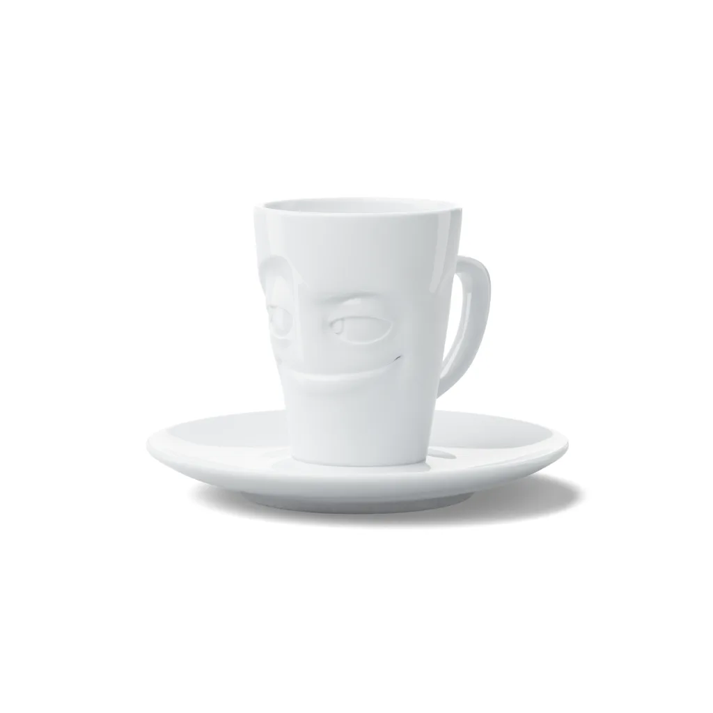 Tasse à expresso expressive, sourire malin, vue de trois-quarts
