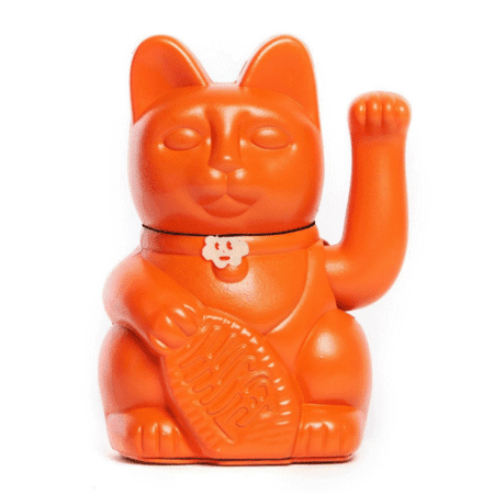 Chat japonais orange porte-bonheur voyage