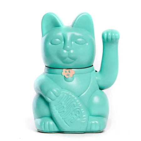 Chat japonais turquoise pour attirer la bonne santé