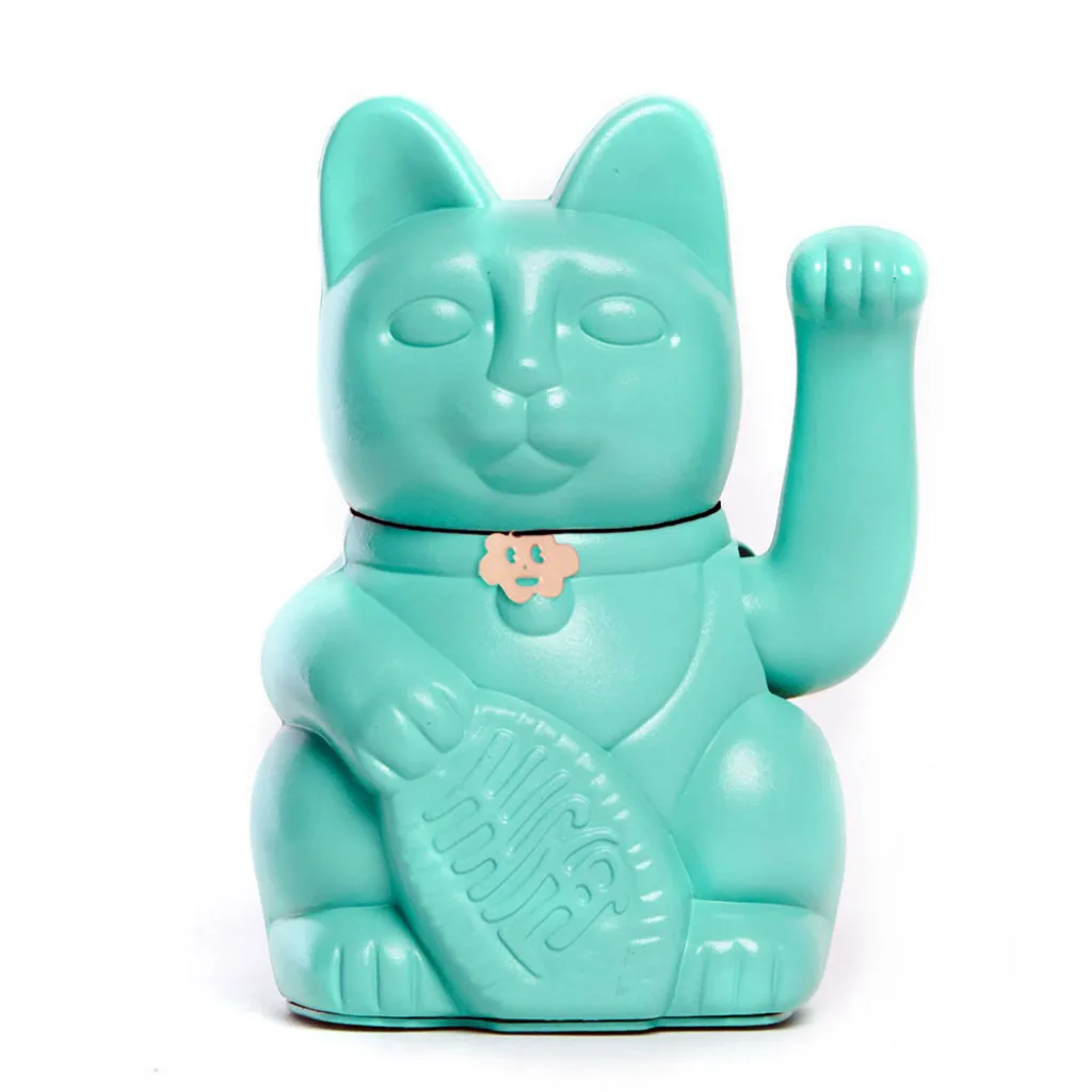 Chat japonais turquoise pour attirer la bonne santé