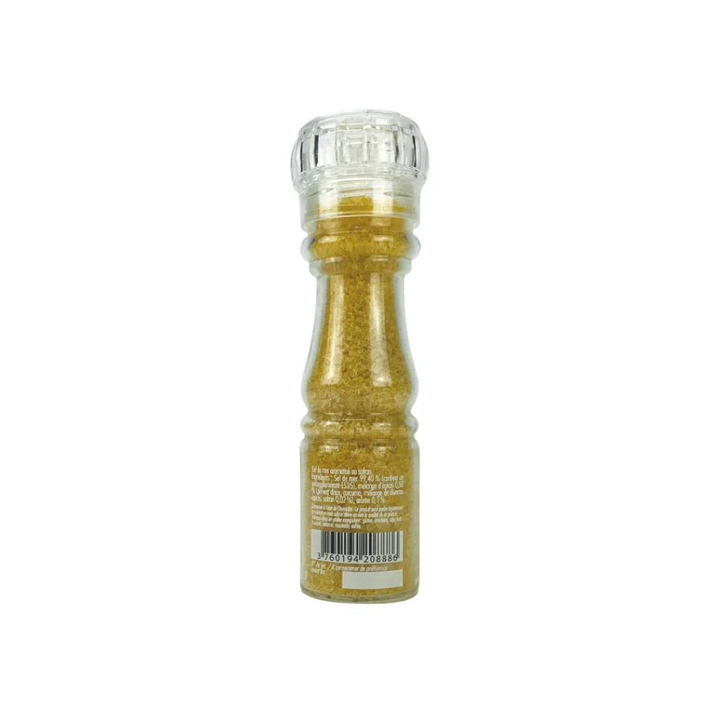 Zoom sur grains de sel aromatisés au safran, curcuma et épices douces – couleur jaune orangée naturelle