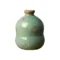 Petit vase Bulle en céramique vert d’eau, forme arrondie, vue frontale