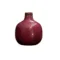 Vase rond rose foncé en céramique, texture brute et patine vieillie