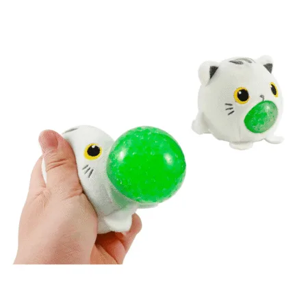 Squishy antistress en forme de chat blanc avec boule verte extensible visible à la pression
