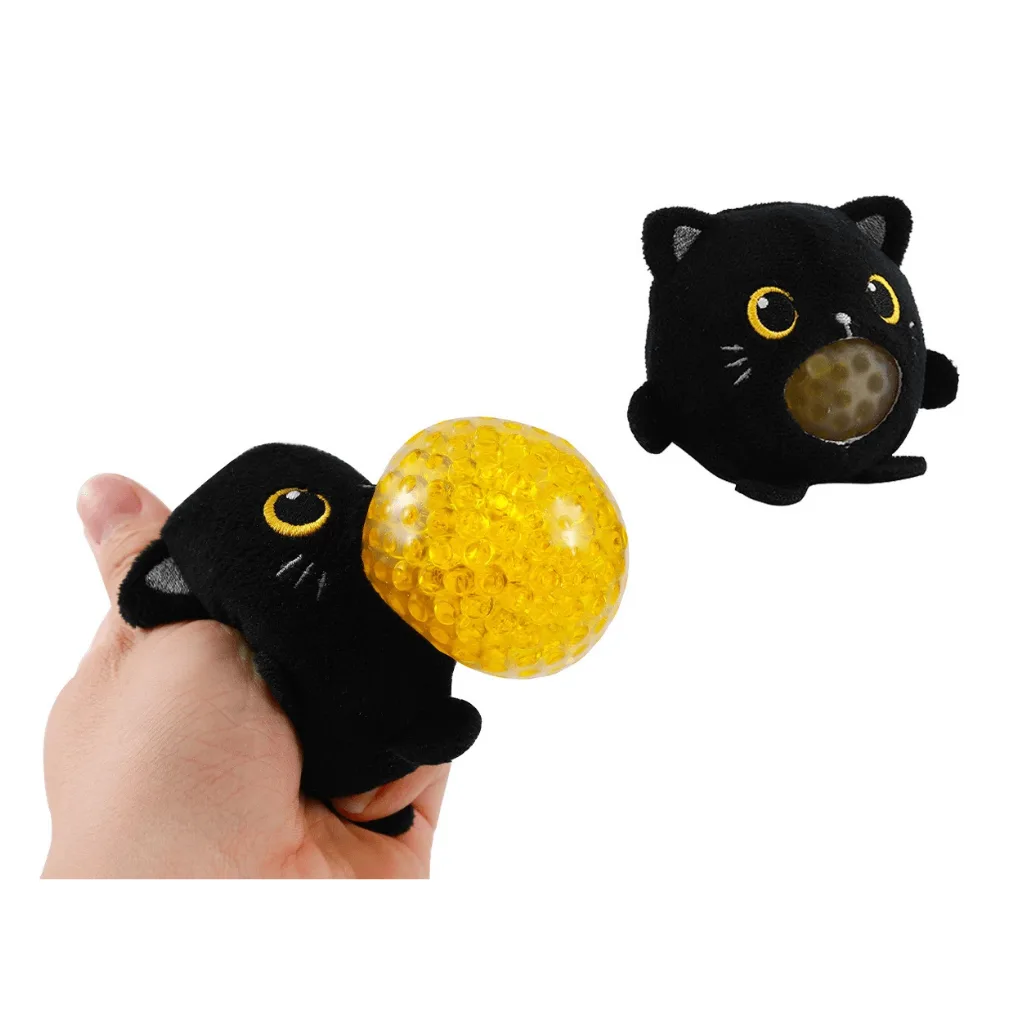 Squishy antistress en forme de chat noir avec boule jaune extensible visible à la pression
